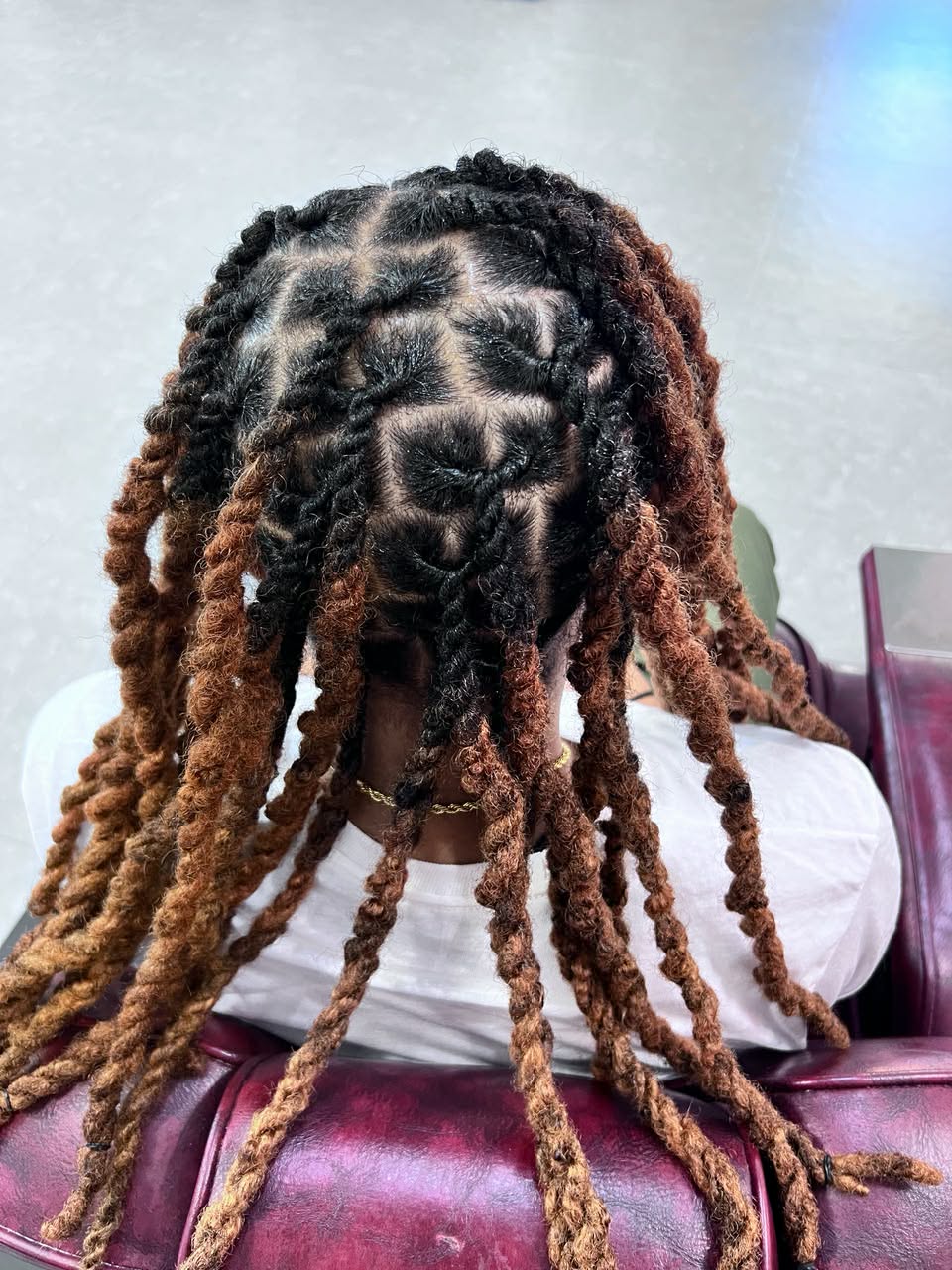 Ombre copper two-strand twists on locs